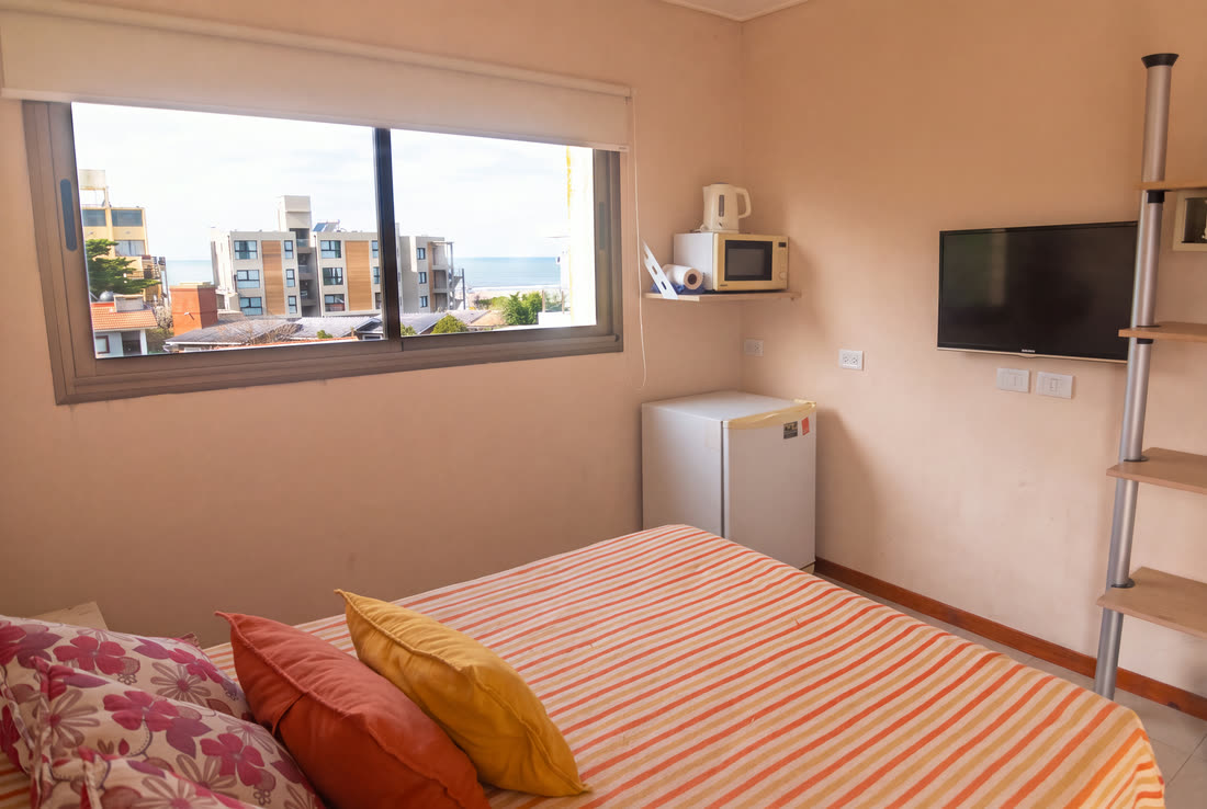 Suite Superior — la suite, con heladera, microondas y tv